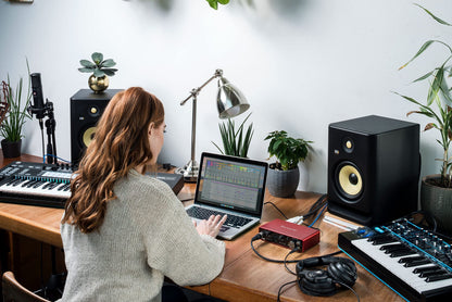 Focusrite Scarlett 4i4 USB-C studio bundle, CR3-X monitors, mic, headphones, boom stand, pop filter, cables, software.